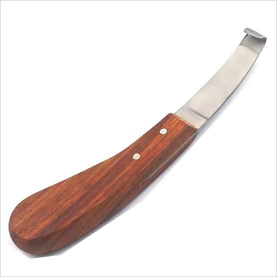 Left-handed hoof knife for veterinary hoof trimming and hoof care